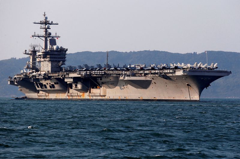 &copy; Reuters. FILE PHOTO: U.S. Navy aircraft carrier, USS Carl Vinson, docks at a port in Danang, Vietnam March 5, 2018. REUTERS/Kham/File Photo