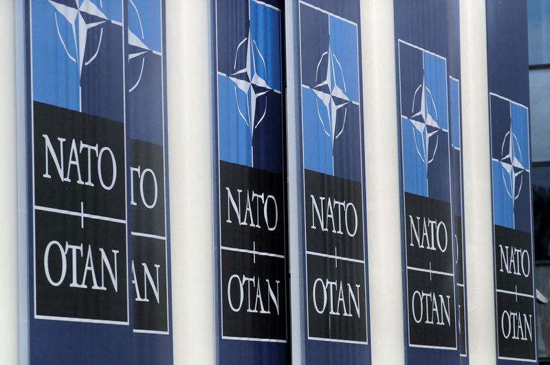 &copy; Reuters. FILE PHOTO: NATO logos are seen at the Alliance headquarters ahead of a NATO Defence Ministers meeting, in Brussels, Belgium, October 21, 2021. REUTERS/Pascal Rossignol/File Photo