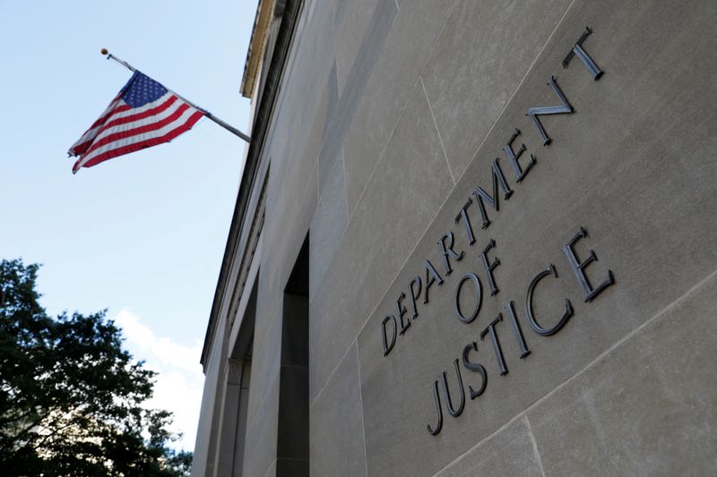 &copy; Reuters. FILE PHOTO: Signage is seen at the United States Department of Justice headquarters in Washington, D.C., U.S., August 29, 2020. REUTERS/Andrew Kelly/File Photo
