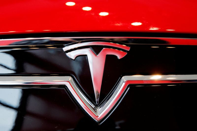 &copy; Reuters. FILE PHOTO: A Tesla logo on a Model S is photographed inside of a Tesla dealership in New York, U.S., April 29, 2016. REUTERS/Lucas Jackson/File Photo