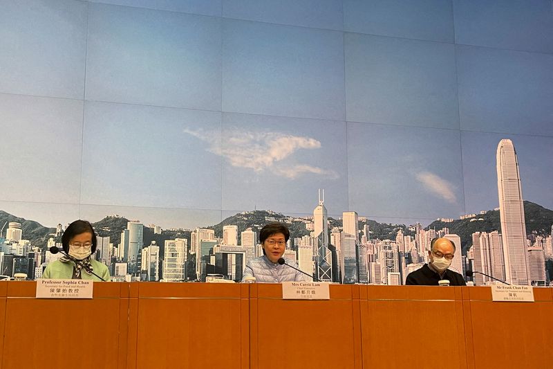 Face time: 'Solemn' Hong Kong leader ditches mask to show how she feels about COVID