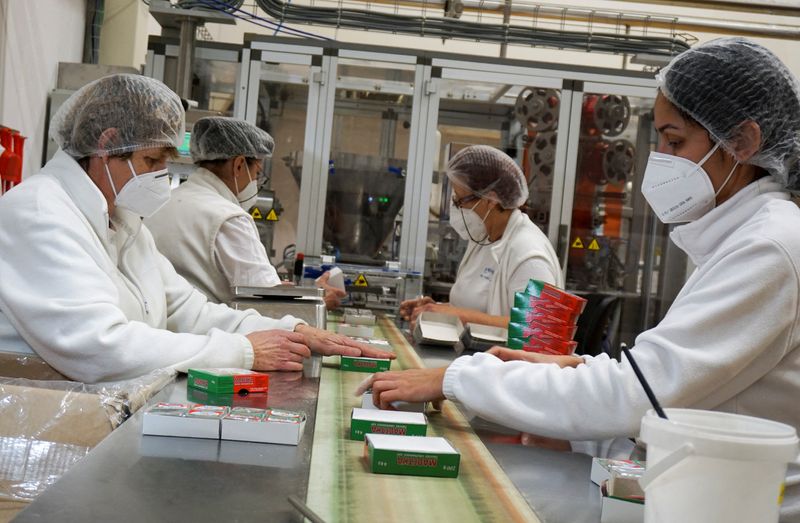 © Reuters. Employees work at Madeta dairy factory in the town of Plana nad Luznici, Czech Republic, January 24, 2022.  REUTERS/Jiri Skacel