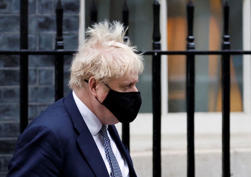 © Reuters. British Prime Minister Boris Johnson walks outside Downing Street in London, Britain, January 25, 2022. REUTERS/Peter Cziborra