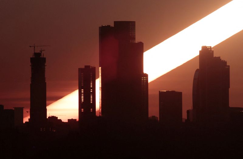 &copy; Reuters. The sun rises behind the skyscrapers of the Moscow International Business Centre, also known as "Moskva-City", in Moscow, Russia April 23, 2018. Picture taken with long exposure. REUTERS/Anton Vaganov     TPX IMAGES OF THE DAY