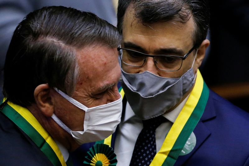 &copy; Reuters. Presidente Jair Bolsonaro conversa com ministro das Relações Exteriores, Carlos França, em cerimônia em Brasília
24/11/2021
REUTERS/Adriano Machado