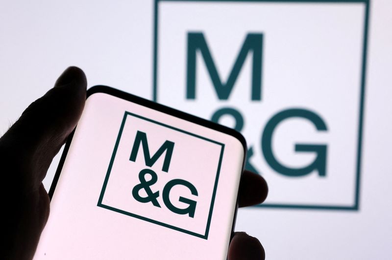 &copy; Reuters. FILE PHOTO: M&G plc logo is seen on a smartphone in front of displayed same logo in this illustration taken, December 1, 2021. REUTERS/Dado Ruvic/Illustration