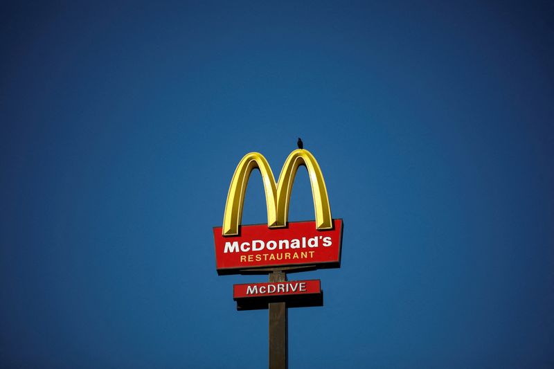 &copy; Reuters. FILE PHOTO: The McDonald's company logo stands on a sign outside a restaurant in Bretigny-sur-Orge, near Paris, France, July 30, 2020. REUTERS/Benoit Tessier/File Photo  GLOBAL BUSINESS WEEK AHEAD