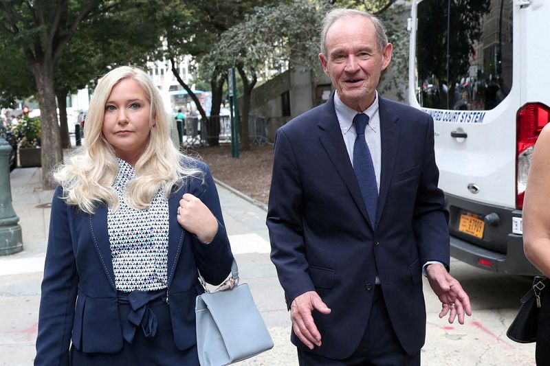 &copy; Reuters. FILE PHOTO: Lawyer David Boies arrives with his client Virginia Giuffre for hearing in the criminal case against Jeffrey Epstein, who died in what a New York City medical examiner ruled a suicide, at federal court in New York, U.S., August 27, 2019. REUTE