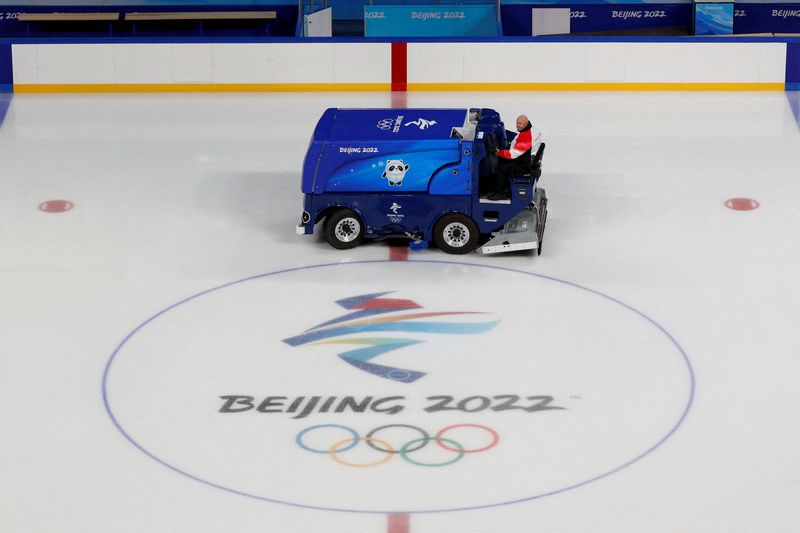 &copy; Reuters. Rick Ragan, chief icemaker for the main hockey venue at the 2022 Winter Olympics, the Wukesong Arena, poses with ice resurfacer, ahead the Beijing 2022 Winter Olympics, in Beijing, China January 26, 2022. REUTERS/Tyrone Siu