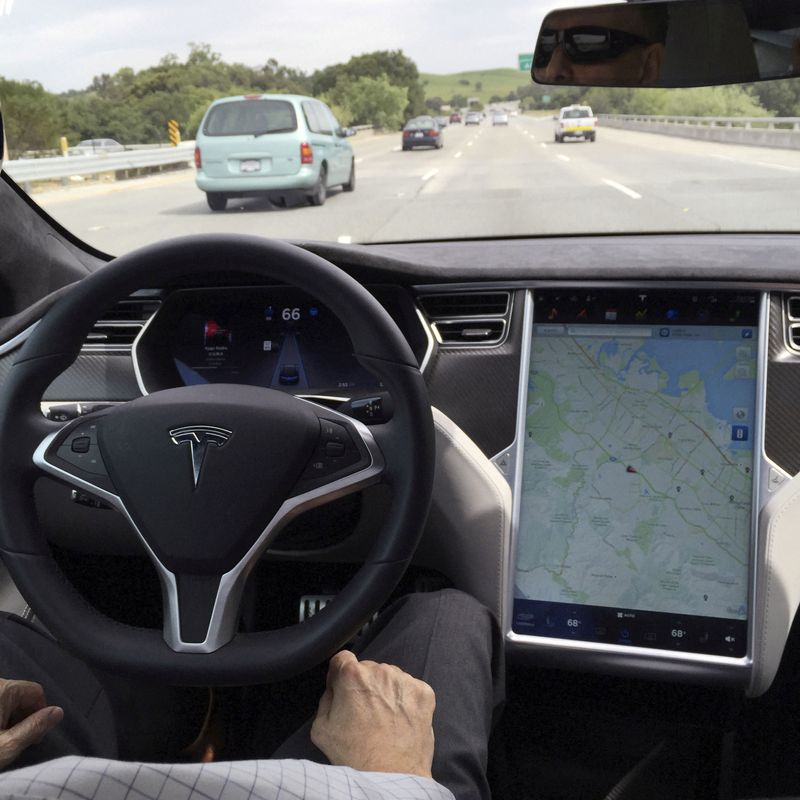 © Reuters. FILE PHOTO: The interior of a Tesla Model S is shown in autopilot mode in San Francisco, California, U.S., April 7, 2016.   REUTERS/Alexandria Sage/File Photo