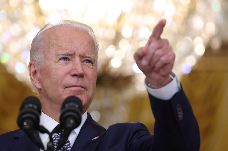 &copy; Reuters. FILE PHOTO: U.S. President Joe Biden answers questions from reporters in the East Room of the White House in Washington, U.S., August 10, 2021. REUTERS/Evelyn Hockstein/File Photo