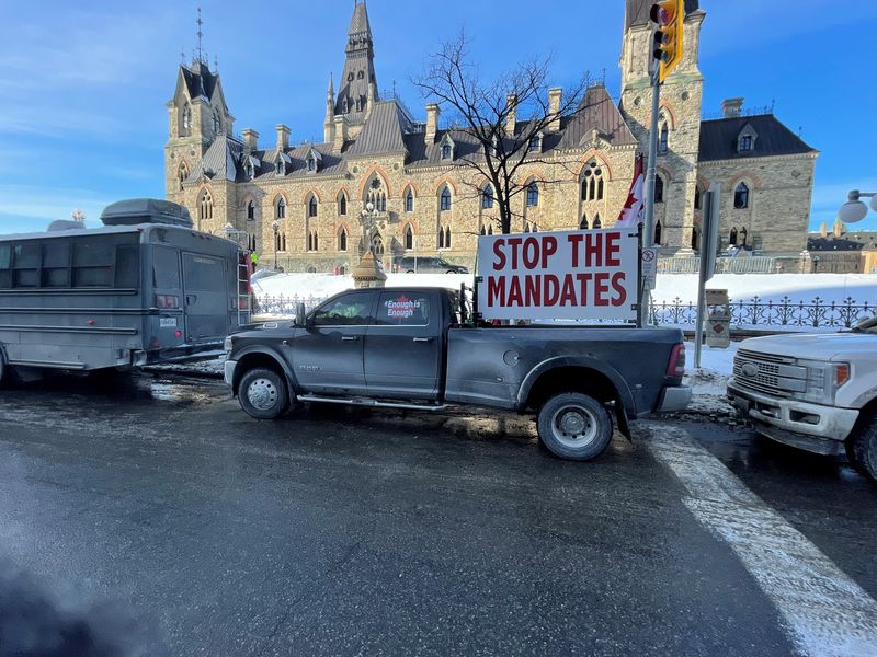 &copy; Reuters. A truck that is part of a trucker convoy to protest the coronavirus disease (COVID-19) vaccine mandates for cross-border truck drivers is seen on Parliament Hill in Ottawa, Ontario January 28, 2022 in this picture obtained from social media. Caryma Sa?d/v