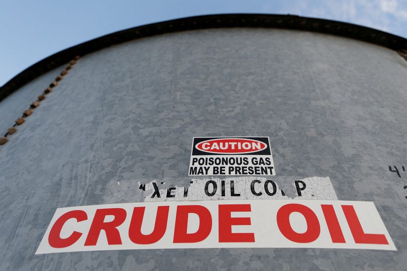 &copy; Reuters. FILE PHOTO: A sticker reads crude oil on the side of a storage tank in the Permian Basin in Mentone, Loving County, Texas, U.S. November 22, 2019.   REUTERS/Angus Mordant