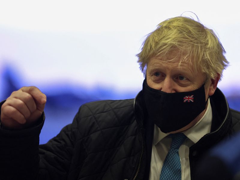 &copy; Reuters. FILE PHOTO: British Prime Minister Boris Johnson gestures during a visit at RAF Valley in Anglesey, Britain January 27, 2022. REUTERS/Carl Recine