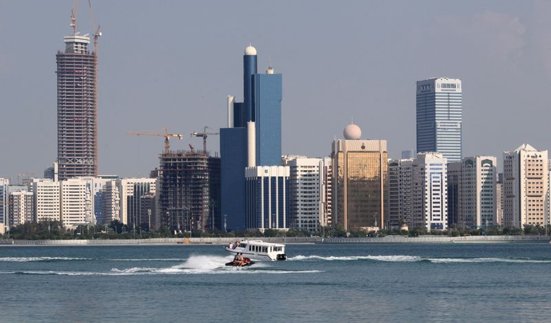 &copy; Reuters. FILE PHOTO: A general view of the Abu Dhabi skyline is seen, December 15, 2009. Abu Dhabi threw its flashy but debt-laden neighbour Dubai a $10 billion lifeline to head off a bond default, cheering Gulf and global markets on Monday but raising questions a