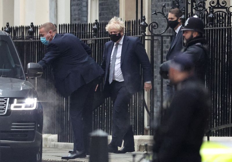 &copy; Reuters. FILE PHOTO: British Prime Minister Boris Johnson walks outside Downing Street in London, Britain, January 25, 2022. REUTERS/Hannah McKay