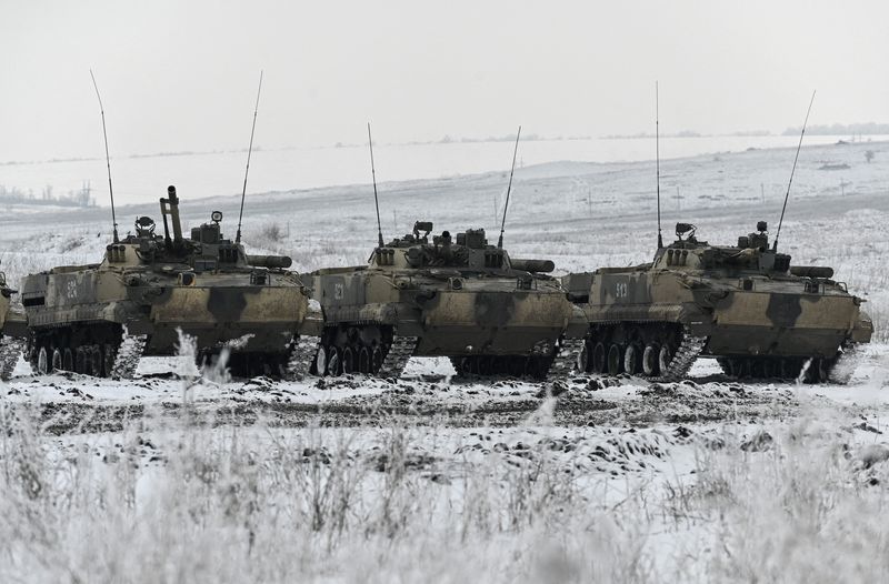 © Reuters. FILE PHOTO: A view shows Russian BMP-3 infantry fighting vehicles during drills held by the armed forces of the Southern Military District at the Kadamovsky range in the Rostov region, Russia January 27, 2022. REUTERS/Sergey Pivovarov
