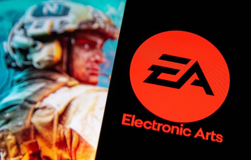 &copy; Reuters. FILE PHOTO: A smartphone with the Electronic Arts logo is seen in front of a displayed character from the Battlefield 2042 game in this illustration taken September 16, 2021. REUTERS/Dado Ruvic/Illustration