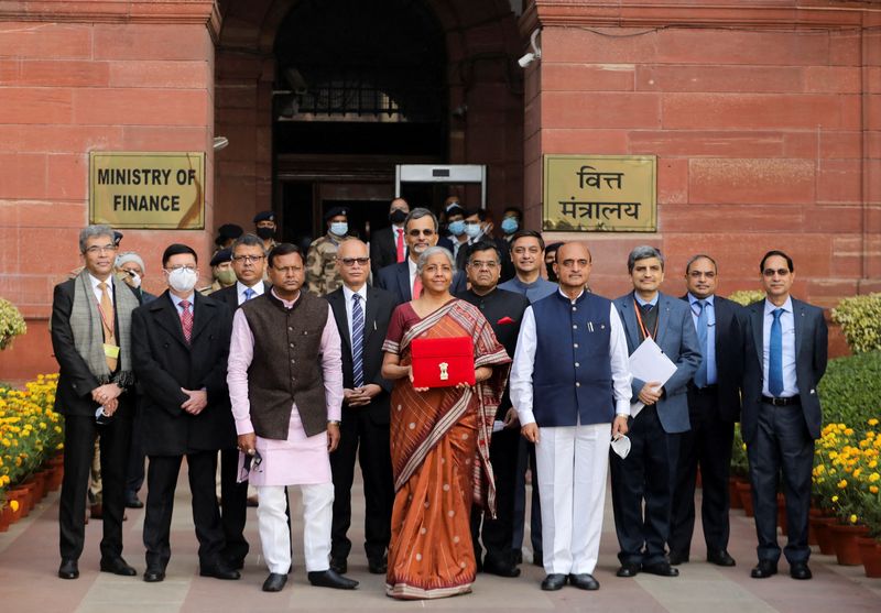 &copy; Reuters. India's Finance Minister Nirmala Sitharaman holds up a folder with the Government of India’s logo as she leaves her office to present the federal budget in the parliament in New Delhi, India, February 1, 2022. REUTERS/Anushree Fadnavis