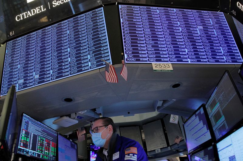 &copy; Reuters. A Specialist Trader works inside a booth on the floor of the New York Stock Exchange (NYSE) in New York City, U.S., January 25, 2022.  REUTERS/Brendan McDermid
