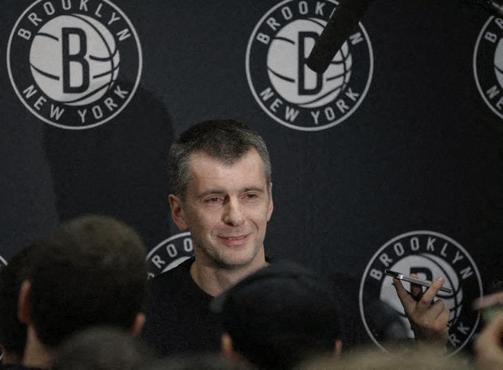 &copy; Reuters. Brooklyn Nets owner Mikhail Prokhorov talks with the media about his decision to fire head coach Avery Johnson, at half time of their NBA basketball game with the Charlotte Bobcats in New York December 28, 2012. REUTERS/Ray Stubblebine  (UNITED STATES - T