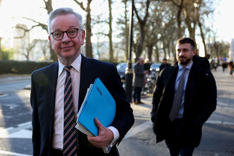© Reuters. British Secretary of State for Levelling Up, Housing and Communities Michael Gove walks outside the Houses of Parliament in London, Britain, February 2, 2022. REUTERS/Henry Nicholls