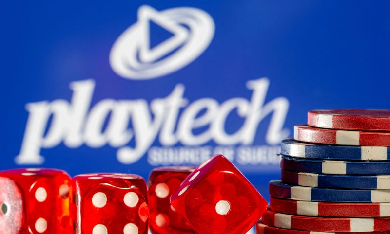 &copy; Reuters. FILE PHOTO: Gambling dice and chips are seen in front of displayed Playtech logo in this illustration taken November 8, 2021. REUTERS/Dado Ruvic/Illustration