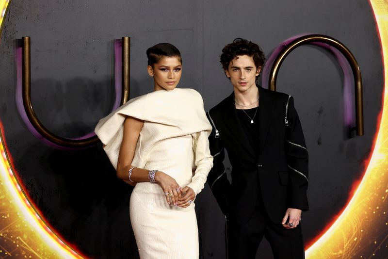 &copy; Reuters. FILE PHOTO: Cast members Zendaya and Timothee Chalamet pose as they arrive for a UK screening of the film "Dune" in London, Britain October 18, 2021. REUTERS/Tom Nicholson