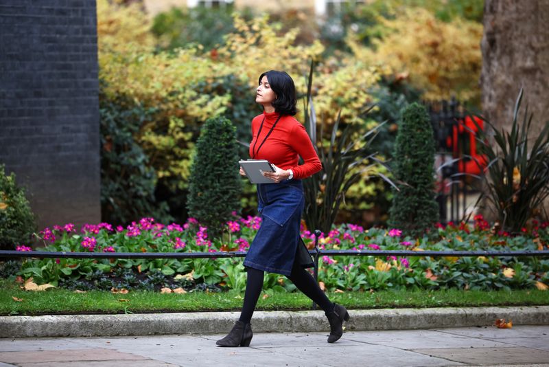 &copy; Reuters. FILE PHOTO: Munira Mirza, Director of the Number 10 Policy Unit, walks outside Downing Street in London, Britain, November 13, 2020. REUTERS/Henry Nicholls