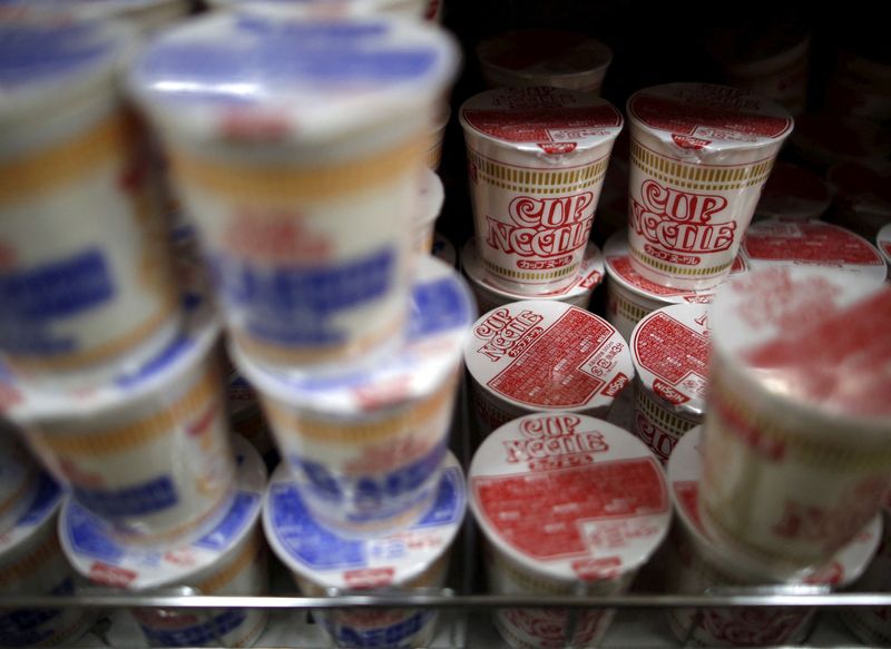 &copy; Reuters. FILE PHOTO: Cup noodles of Japan's instant noodle maker Nissin Foods are seen stacked at a supermarket in Tokyo, Japan, November 16, 2015.   REUTERS/Issei Kato/File Photo