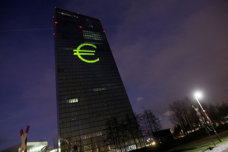 &copy; Reuters. FILE PHOTO: A Euro sign is seen moments before a symphony of light consisting of bars, lines and circles in blue and yellow, the colours of the European Union, illuminates the south facade of the European Central Bank (ECB) headquarters in Frankfurt, Germ