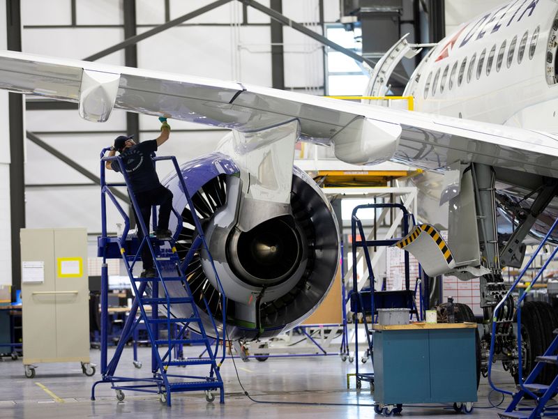 &copy; Reuters. FILE PHOTO: An employee works on an Airbus A220-300 at the Airbus facility in Mirabel, Quebec, Canada February 20, 2020.  REUTERS/Christinne Muschi/File Photo