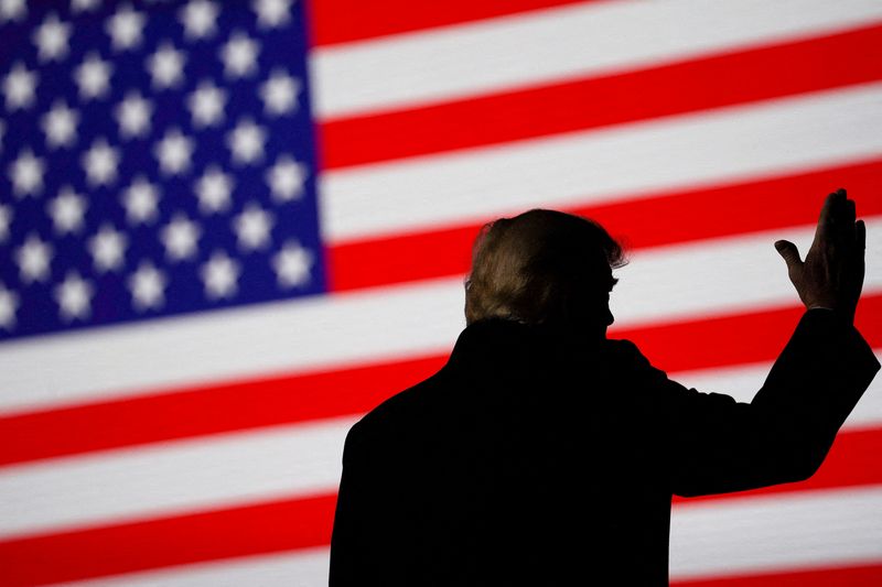 &copy; Reuters. FILE PHOTO: Former U.S. President Donald Trump gestures during a rally in Conroe, Texas, U.S., January 29, 2022. REUTERS/Go Nakamura