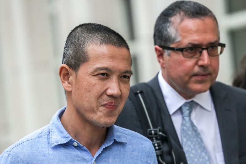 &copy; Reuters. FILE PHOTO: Ex-Goldman Sachs banker Roger Ng leaves the federal court in New York, U.S., May 6, 2019. REUTERS/Jeenah Moon/File Photo