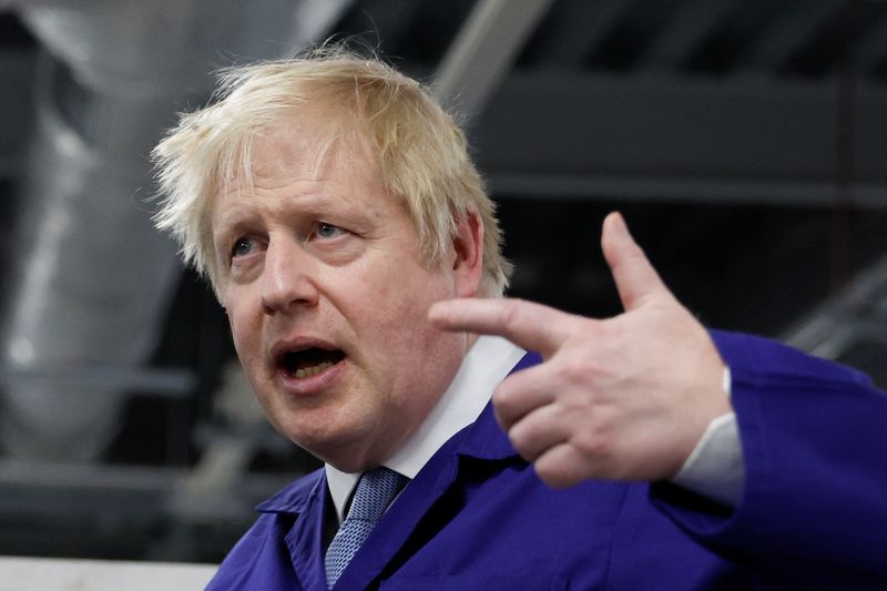 &copy; Reuters. FILE PHOTO: British Prime Minister Boris Johnson gestures at the technology centre at Hopwood Hall College, in Middleton, Greater Manchester, Britain, February 3, 2022. REUTERS/Jason Cairnduff/Pool