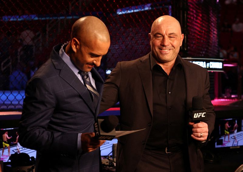 &copy; Reuters. FILE PHOTO: May 15, 2021; Houston, Texas, USA; UFC ring announcer Joe Rogan (right) is interviewed before UFC 262 at Toyota Center. Mandatory Credit: Troy Taormina-USA TODAY Sports - 16090519