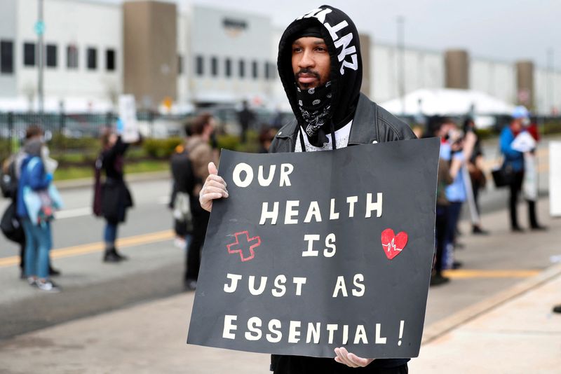 &copy; Reuters. FILE PHOTO: Former Amazon employee Christian Smalls stands with fellow demonstrators during a protest outside of an Amazon warehouse as the outbreak of the coronavirus disease (COVID-19) continues in the Staten Island borough of New York U.S., May 1, 2020