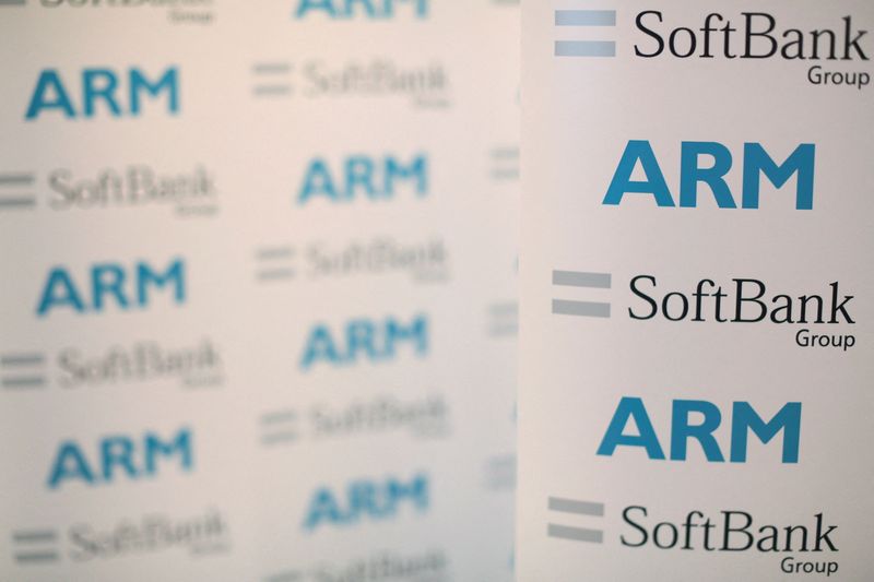 &copy; Reuters. FILE PHOTO: An ARM and SoftBank Group branded board is displayed at a news conference in London, Britain July 18, 2016. REUTERS/Neil Hall