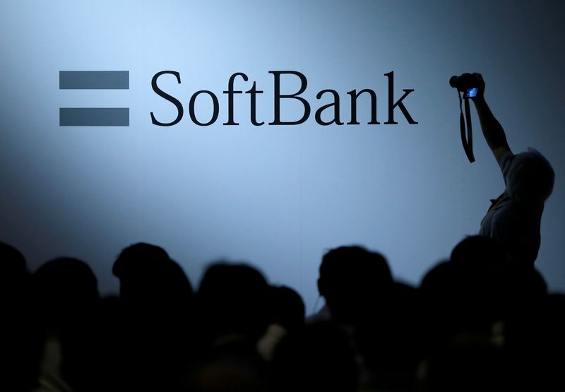 &copy; Reuters. FILE PHOTO: The logo of SoftBank Group Corp is displayed at SoftBank World 2017 conference in Tokyo, Japan, July 20, 2017. REUTERS/Issei Kato