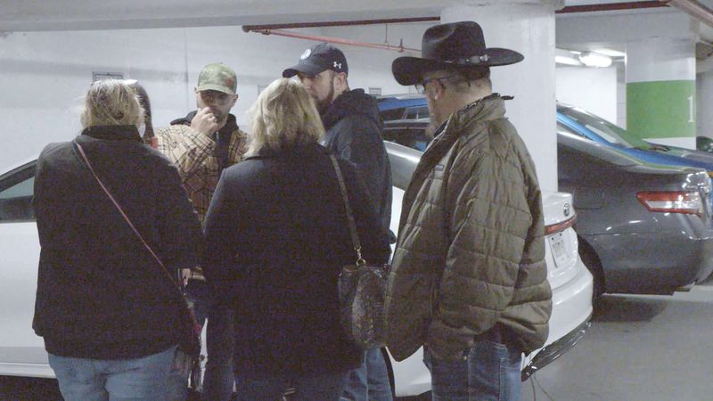 © Reuters. Enrique Tarrio, Chairman of the Proud Boys, and Stewart Rhodes, founder of the Oath Keepers, attend a meeting in a garage in Washington, U.S. in a still image taken from video January 5, 2021, the day before the January 6 riot. Saboteur Media/Handout via REUTERS. To match Special Report USA-PROUDBOYS/MEETING 