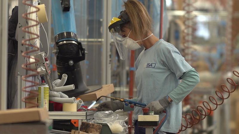 &copy; Reuters. FILE PHOTO: A worker, wearing a mask, uses a blowtorch inside the ISA factory that has introduced new safety measures to respect social distancing among workers to stop the spread of the coronavirus disease (COVID-19) in Bastia Umbra, Italy, April 22, 202