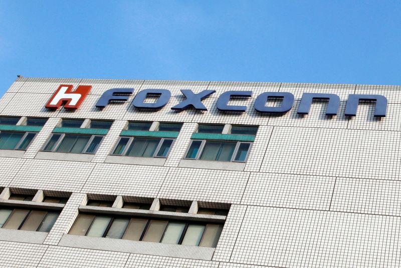 &copy; Reuters. FILE PHOTO: The Foxconn logo is seen on the headquarters building in Tucheng, Taipei County May 25, 2010.  REUTERS/Nicky Loh