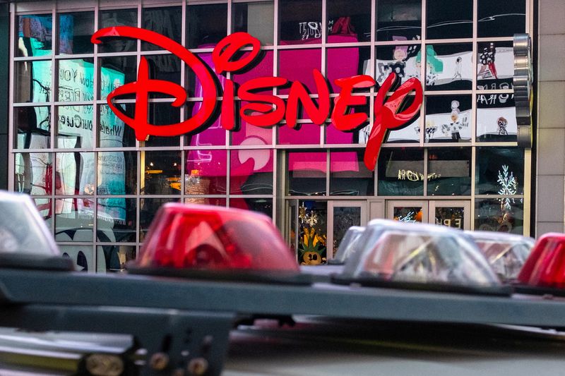 © Reuters. FILE PHOTO: The logo of the Times Square Disney store is seen in Times Square, New York City, U.S. December 5, 2019. REUTERS/Nick Pfosi