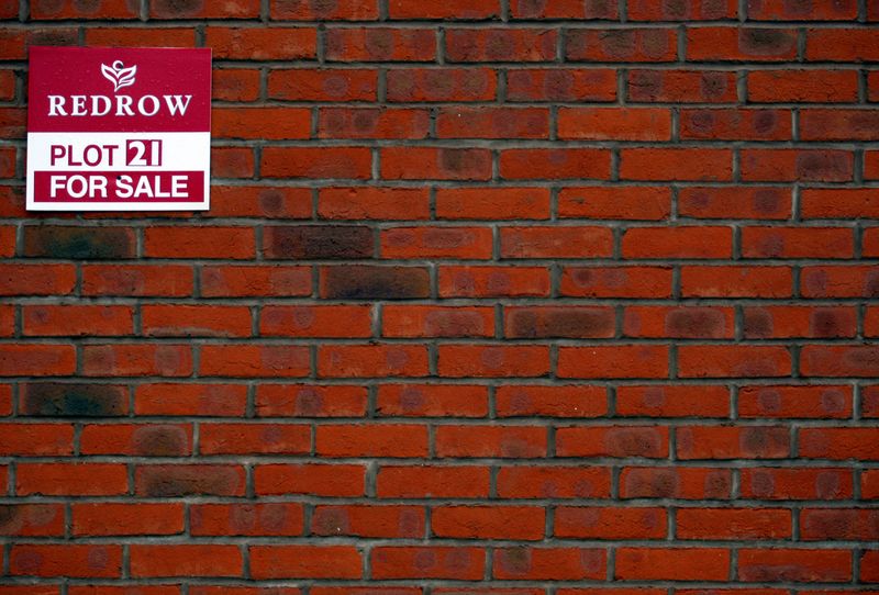 &copy; Reuters. FILE PHOTO: Signage is seen on a house on a Redrow housing development in Church Greasly, Britain, September 9, 2008. REUTERS/Darren Staples