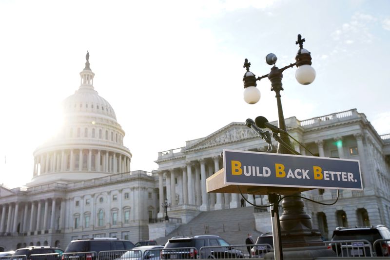 &copy; Reuters. FILE PHOTO: A lectern is seen before the start of a media event about the Build Back Better package with Senate Democrats outside the U.S. Capitol in Washington, December 15, 2021. REUTERS/Elizabeth Frantz/File Photo