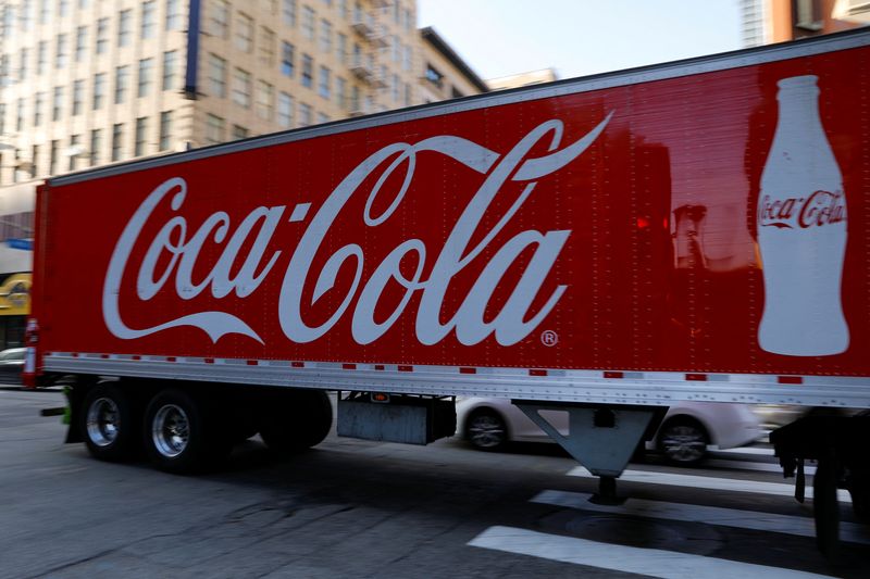 &copy; Reuters. FILE PHOTO: A Coca-Cola truck makes its way through downtown Los Angeles, California, U.S., October 24, 2018. REUTERS/Mike Blake/File Photo