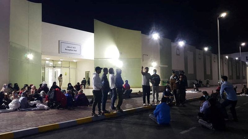 &copy; Reuters. لاجئون أفغان في الإمارات خلال احتجاج على توقف عملية إعادة التوطين بالولايات المتحدة في صورة من وسائل التواصل الاجتماعي يوم الخميس. محظور إع