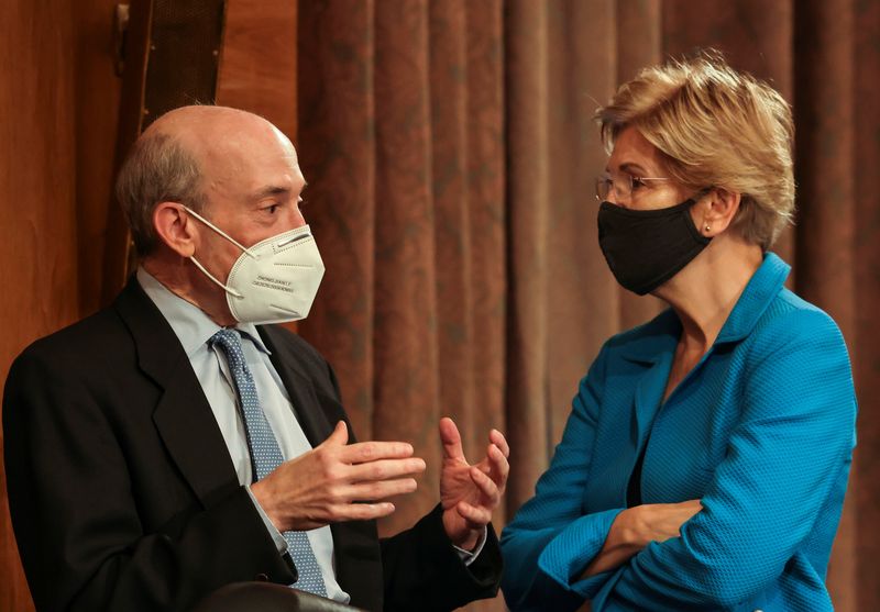 &copy; Reuters. FILE PHOTO: U.S. Securities and Exchange Commission (SEC) Chair Gary Gensler speaks with Senator Elizabeth Warren (D-MA) prior to testifying before a Senate Banking, Housing, and Urban Affairs Committee oversight hearing on the SEC on Capitol Hill in Wash