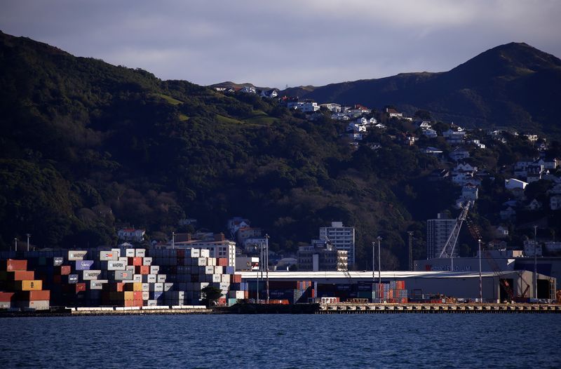 &copy; Reuters. FILE PHOTO: Containers sit stacked at a port terminal with residential houses on a hill behind in Wellington, New Zealand, July 2, 2017. REUTERS/David Gray