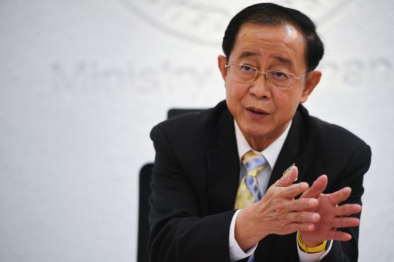&copy; Reuters. FILE PHOTO: Thai finance minister Arkhom Termpittayapaisith speaks during an interview with Reuters in Bangkok, Thailand January 21, 2021. REUTERS/Chalinee Thirasupa